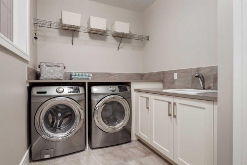 64 Mystic Ridge Way Sw, Calgary, AB - Indoor Photo Showing Laundry Room