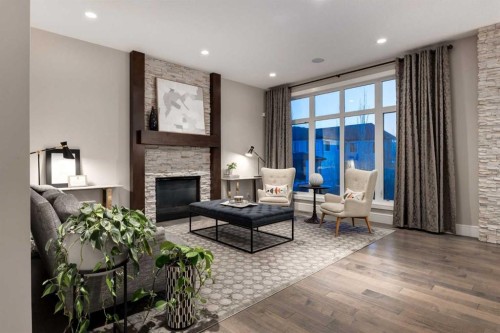 64 Mystic Ridge Way Sw, Calgary, AB - Indoor Photo Showing Living Room With Fireplace