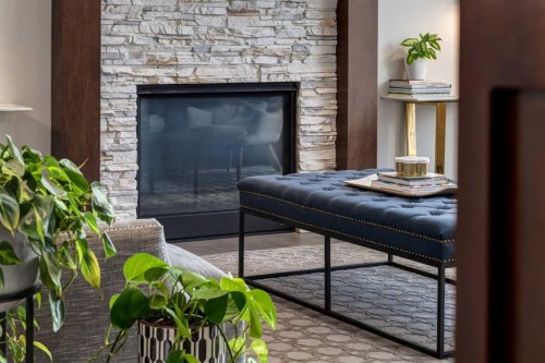 64 Mystic Ridge Way Sw, Calgary, AB - Indoor Photo Showing Living Room With Fireplace