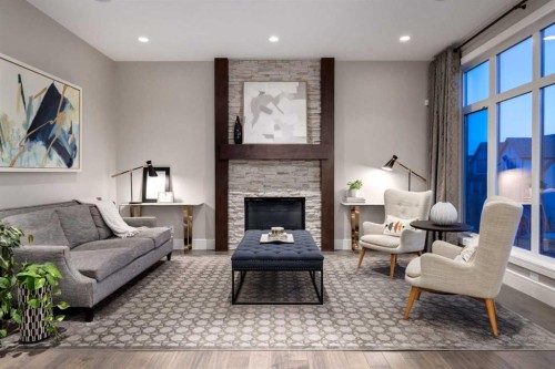64 Mystic Ridge Way Sw, Calgary, AB - Indoor Photo Showing Living Room With Fireplace