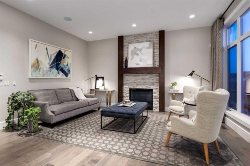 64 Mystic Ridge Way Sw, Calgary, AB - Indoor Photo Showing Living Room With Fireplace