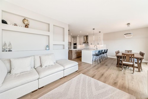 80 Vantage Drive, Cochrane, AB - Indoor Photo Showing Living Room