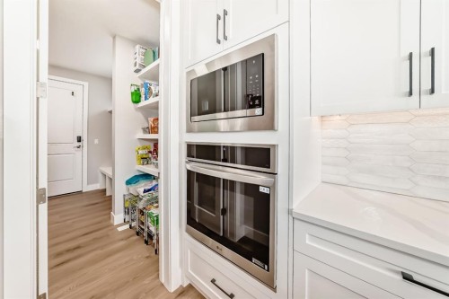 80 Vantage Drive, Cochrane, AB - Indoor Photo Showing Kitchen
