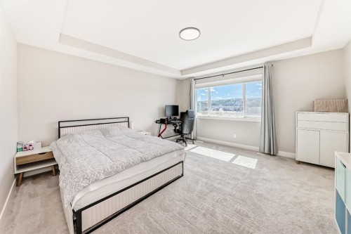 80 Vantage Drive, Cochrane, AB - Indoor Photo Showing Bedroom