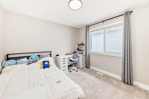 80 Vantage Drive, Cochrane, AB - Indoor Photo Showing Bedroom