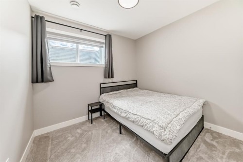 80 Vantage Drive, Cochrane, AB - Indoor Photo Showing Bedroom