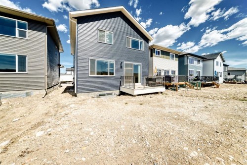 80 Vantage Drive, Cochrane, AB - Outdoor With Deck Patio Veranda
