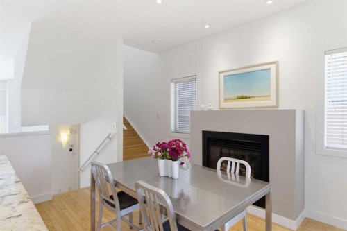10 Erlton Terrace Sw, Calgary, AB - Indoor Photo Showing Dining Room With Fireplace