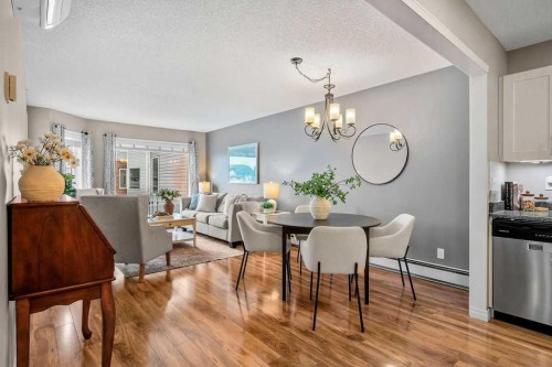 1311-1311 Hawksbrow Point Nw, Calgary, AB - Indoor Photo Showing Dining Room