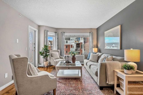 1311-1311 Hawksbrow Point Nw, Calgary, AB - Indoor Photo Showing Living Room