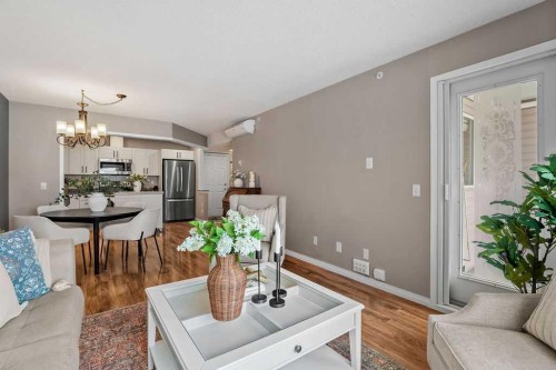 1311-1311 Hawksbrow Point Nw, Calgary, AB - Indoor Photo Showing Living Room