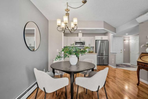 1311-1311 Hawksbrow Point Nw, Calgary, AB - Indoor Photo Showing Dining Room