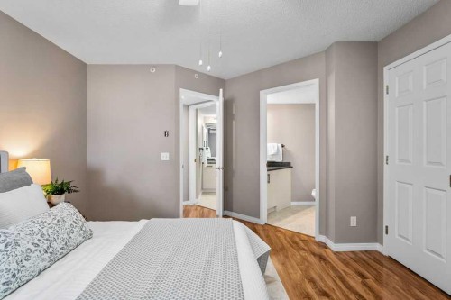 1311-1311 Hawksbrow Point Nw, Calgary, AB - Indoor Photo Showing Bedroom