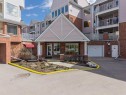 1311-1311 Hawksbrow Point Nw, Calgary, AB  - Outdoor With Balcony With Facade 