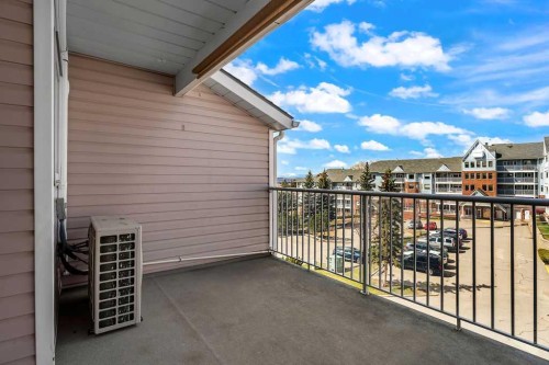 1311-1311 Hawksbrow Point Nw, Calgary, AB - Outdoor With Balcony With Exterior