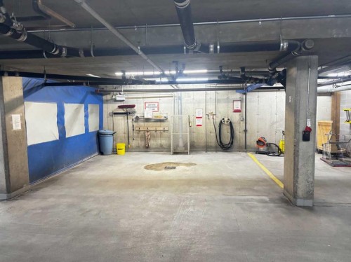 1311-1311 Hawksbrow Point Nw, Calgary, AB - Indoor Photo Showing Garage