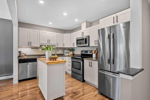 1311-1311 Hawksbrow Point Nw, Calgary, AB - Indoor Photo Showing Kitchen With Stainless Steel Kitchen With Upgraded Kitchen
