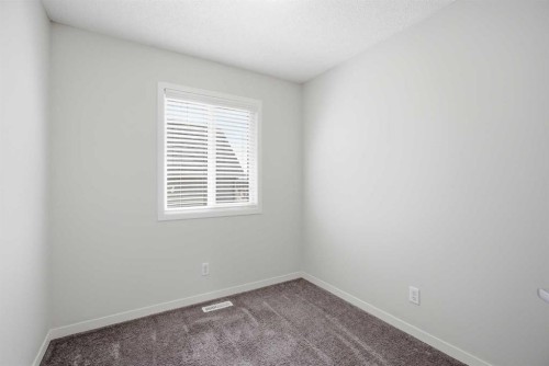 101 New Brighton Walk Se, Calgary, AB - Indoor Photo Showing Other Room