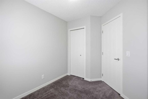 101 New Brighton Walk Se, Calgary, AB - Indoor Photo Showing Other Room