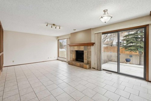40 Scenic Place Nw, Calgary, AB - Indoor With Fireplace