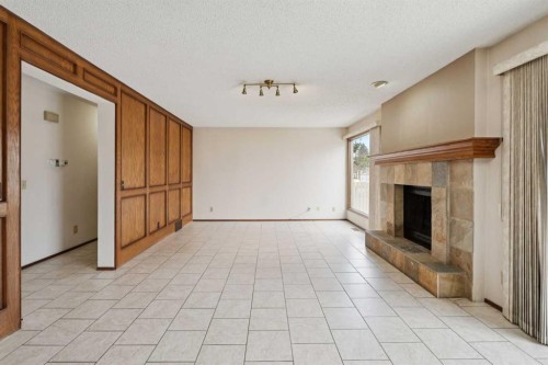 40 Scenic Place Nw, Calgary, AB - Indoor With Fireplace