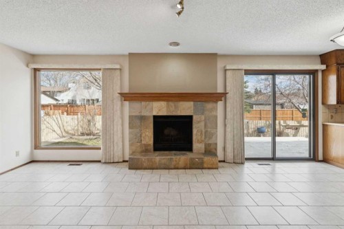 40 Scenic Place Nw, Calgary, AB - Indoor With Fireplace