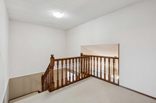 40 Scenic Place Nw, Calgary, AB - Indoor Photo Showing Other Room