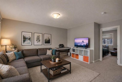 52 West Coach Court Sw, Calgary, AB - Indoor Photo Showing Living Room