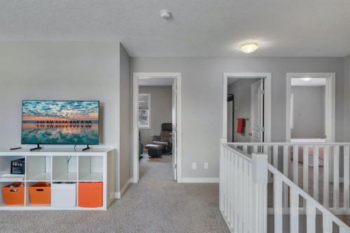52 West Coach Court Sw, Calgary, AB - Indoor Photo Showing Other Room