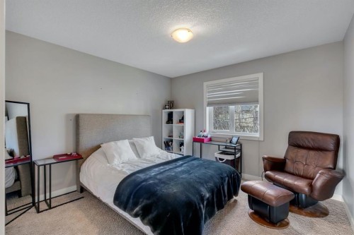 52 West Coach Court Sw, Calgary, AB - Indoor Photo Showing Bedroom