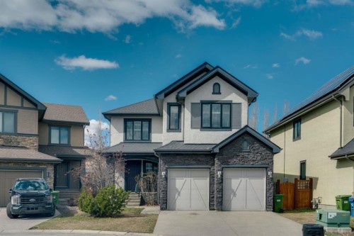 52 West Coach Court Sw, Calgary, AB - Outdoor With Facade