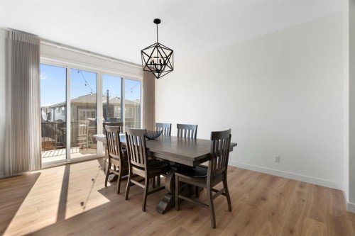 164 Precedence Hill, Cochrane, AB - Indoor Photo Showing Dining Room