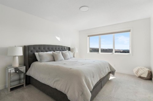 164 Precedence Hill, Cochrane, AB - Indoor Photo Showing Bedroom