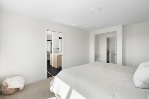 164 Precedence Hill, Cochrane, AB - Indoor Photo Showing Bedroom