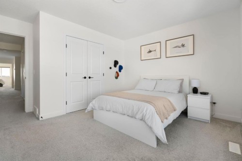 164 Precedence Hill, Cochrane, AB - Indoor Photo Showing Bedroom