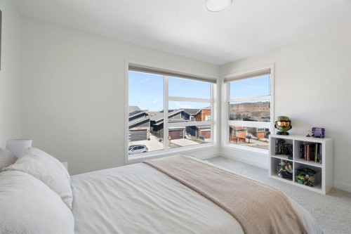164 Precedence Hill, Cochrane, AB - Indoor Photo Showing Bedroom