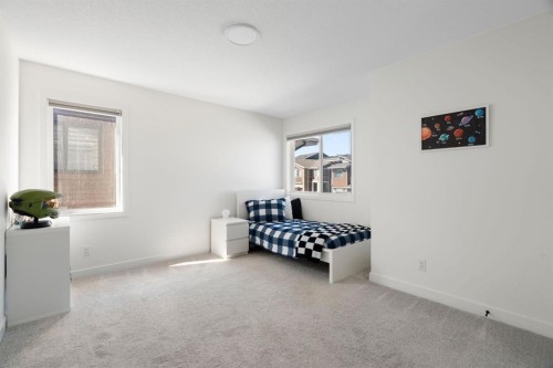 164 Precedence Hill, Cochrane, AB - Indoor Photo Showing Bedroom