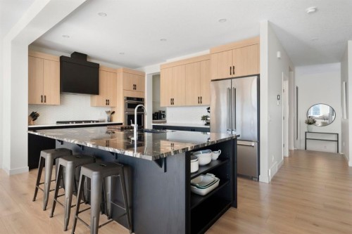 164 Precedence Hill, Cochrane, AB - Indoor Photo Showing Kitchen With Stainless Steel Kitchen With Upgraded Kitchen