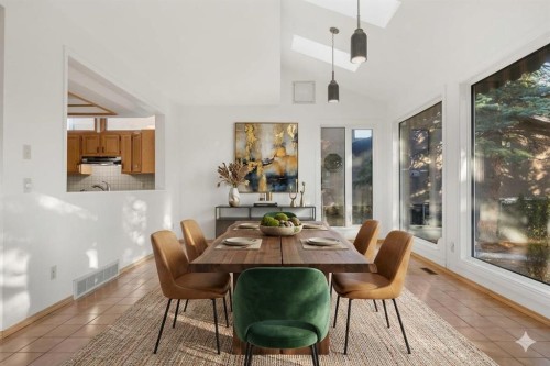 907 Shawnee Drive Sw, Calgary, AB - Indoor Photo Showing Dining Room