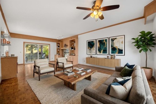 907 Shawnee Drive Sw, Calgary, AB - Indoor Photo Showing Living Room