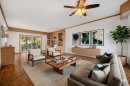 907 Shawnee Drive Sw, Calgary, AB  - Indoor Photo Showing Living Room 