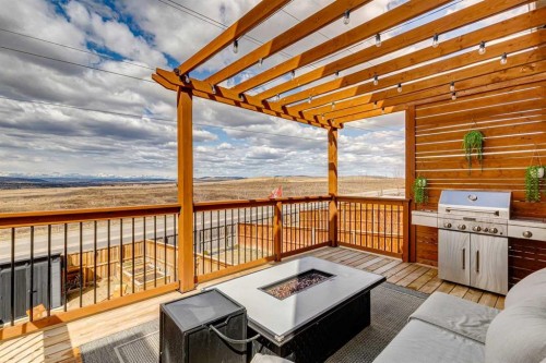 99 Heritage Heights, Cochrane, AB - Outdoor With Deck Patio Veranda With Exterior