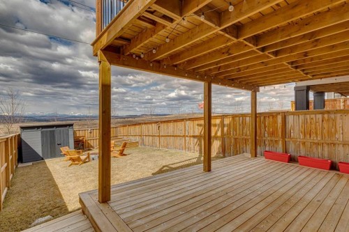 99 Heritage Heights, Cochrane, AB - Outdoor With Deck Patio Veranda With Exterior
