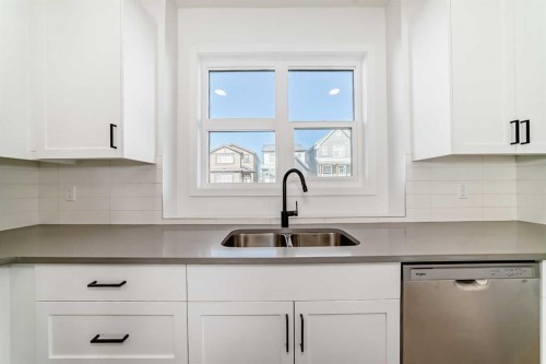 904-30 Rochester View Nw, Calgary, AB - Indoor Photo Showing Kitchen With Double Sink