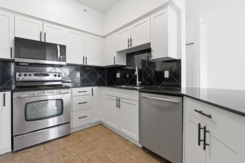 1507-8710 Horton Road Sw, Calgary, AB - Indoor Photo Showing Kitchen