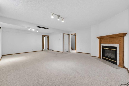 35 Douglasview Park Se, Calgary, AB - Indoor With Fireplace
