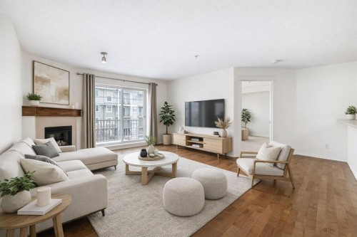 4305-115 Prestwick Villas Se, Calgary, AB - Indoor Photo Showing Living Room With Fireplace