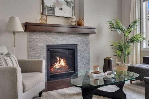 175 Brightoncrest Point Se, Calgary, AB - Indoor Photo Showing Living Room With Fireplace