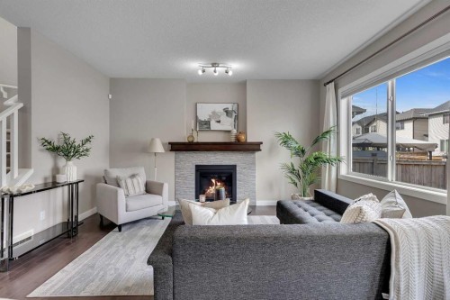 175 Brightoncrest Point Se, Calgary, AB - Indoor Photo Showing Living Room With Fireplace
