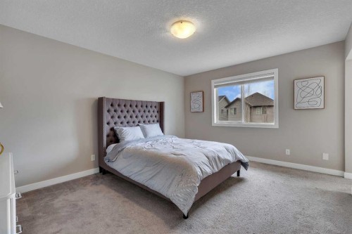 175 Brightoncrest Point Se, Calgary, AB - Indoor Photo Showing Bedroom